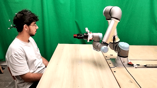 Live experiment footage showing the head-gaze conflict setup.